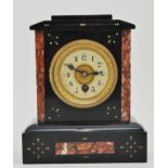 Small Victorian marble mantel clock, with stylised decoration to a plinth base, brass dial,