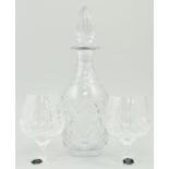 Cut glass decanter, another cut glass decanter,