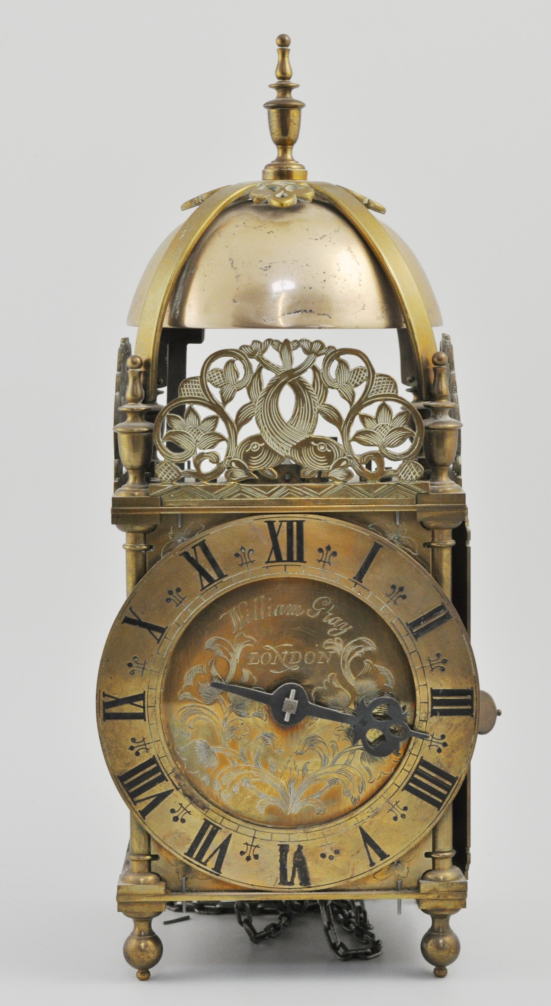 Brass striking lantern clock, 6" dial with Roman numerals,