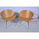 Pair of modern laminated birch chairs, tubular metal frames, width 67cm.