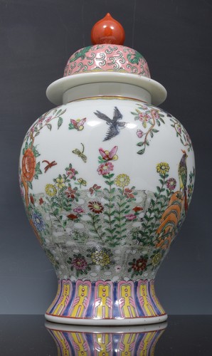 Chinese porcelain baluster shape vase, polychrome decoration, matched domed lid, 34cm.