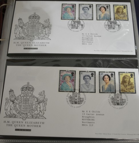 Stamps:  Four Royal Mail first day cover albums.