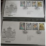 Stamps:  Four Royal Mail first day cover albums.