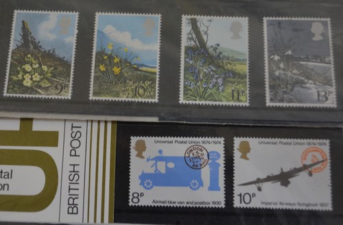 Stamps:  Three Stanley Gibbons ringbinder albums of first day covers and some loose covers.