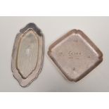 Square shape silver coaster, London 1964, engraved Martel Co 1715-1965, 9.5cm and a silver pin