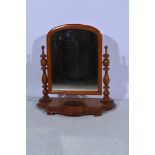 Victorian mahogany toilet mirror, arched plate, turned uprights, platform incorporating a