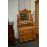 Victorian satin walnut dressing chest, bevelled mirror back, two raised trinket drawers, three long
