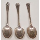 Set of twelve silver teaspoons, Sheffield 1922, individual decorative backs, boxed.