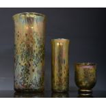 Three Isle of White gold splashed cylindrical vases, 24cm and smaller, a similar beaker vase and