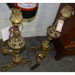 Pair of cast brass chenets, pierced urn form, 58cm.