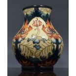 Moorcroft pear shape vase, Festive Flame, 2004, signed twice by the artist, Kerry Goodwin, 16cm.