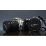 Canon Eos 300D digital camera, with a zoom lens, a Canon Eos 300 camera and a Mamiya ZE camera,