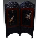 Japanese stained wood and lacquered two fold screen, height 181cm.