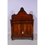 Victorian mahogany chiffonier, shaped and carved back with scrolled outlines, fitted with a single