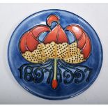 Moorcroft Centennial coaster, 1997 of dished form for MCC, diameter 12cm, boxed.