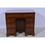 George III style mahogany kneehole dressing table, 19th Century, rectangular top with banding,