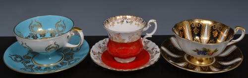 Collection of decorative tea cup and saucers, and coffee cans and saucers.