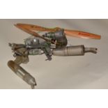 Three R/C glow engines, for spares or repair, including 8 assorted propellors.