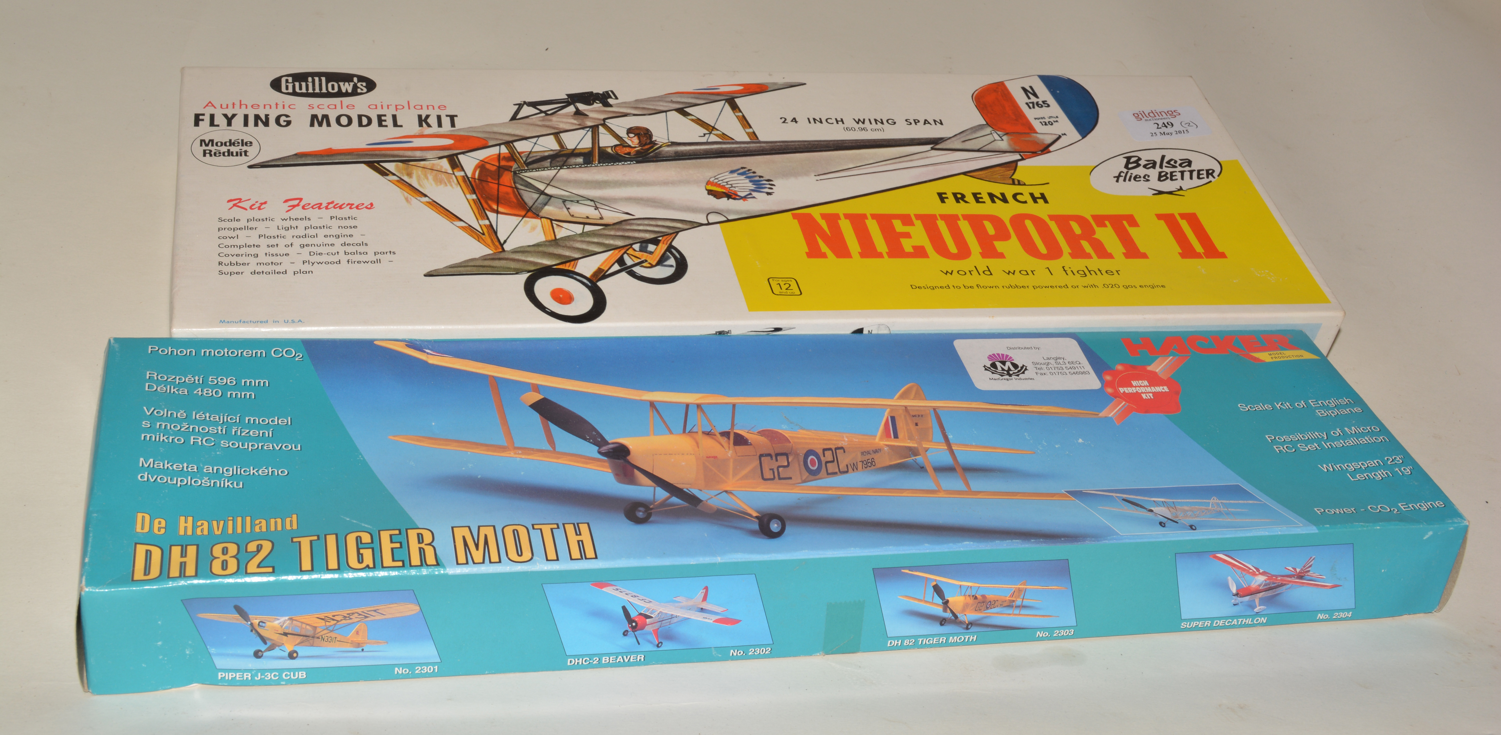 Two scale rubber kits, Piper Cub and Nieuport II.