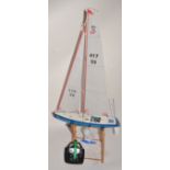 25" R/C Yacht with stand and transmitter.