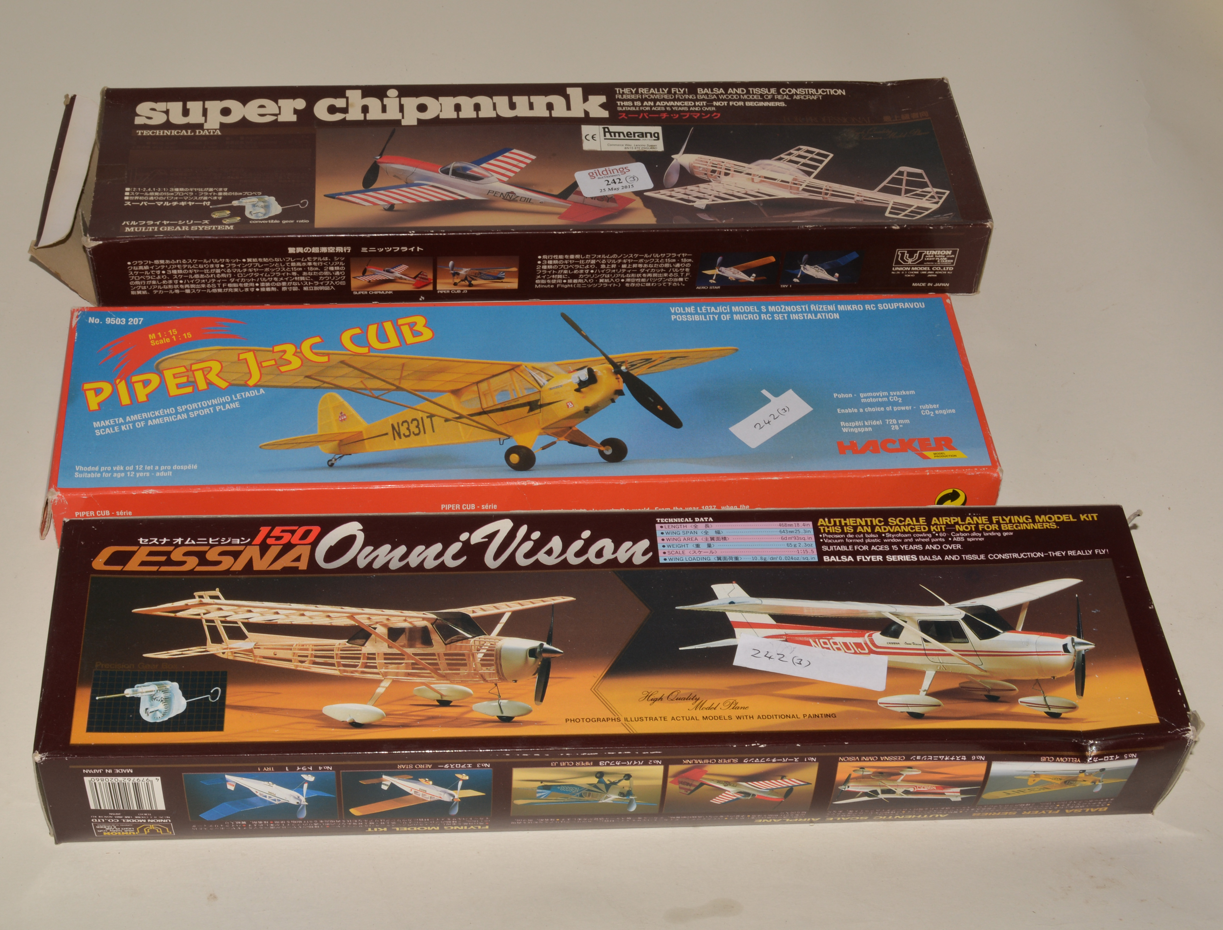 Three scale rubber kits,  Cessna 150, Piper J-3 Cub and Super Chipmunk.