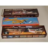 Three scale rubber kits,  Cessna 150, Piper J-3 Cub and Super Chipmunk.
