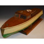 Vintage type Sprite speed boat, with early radio and ED comp special engine on stand.