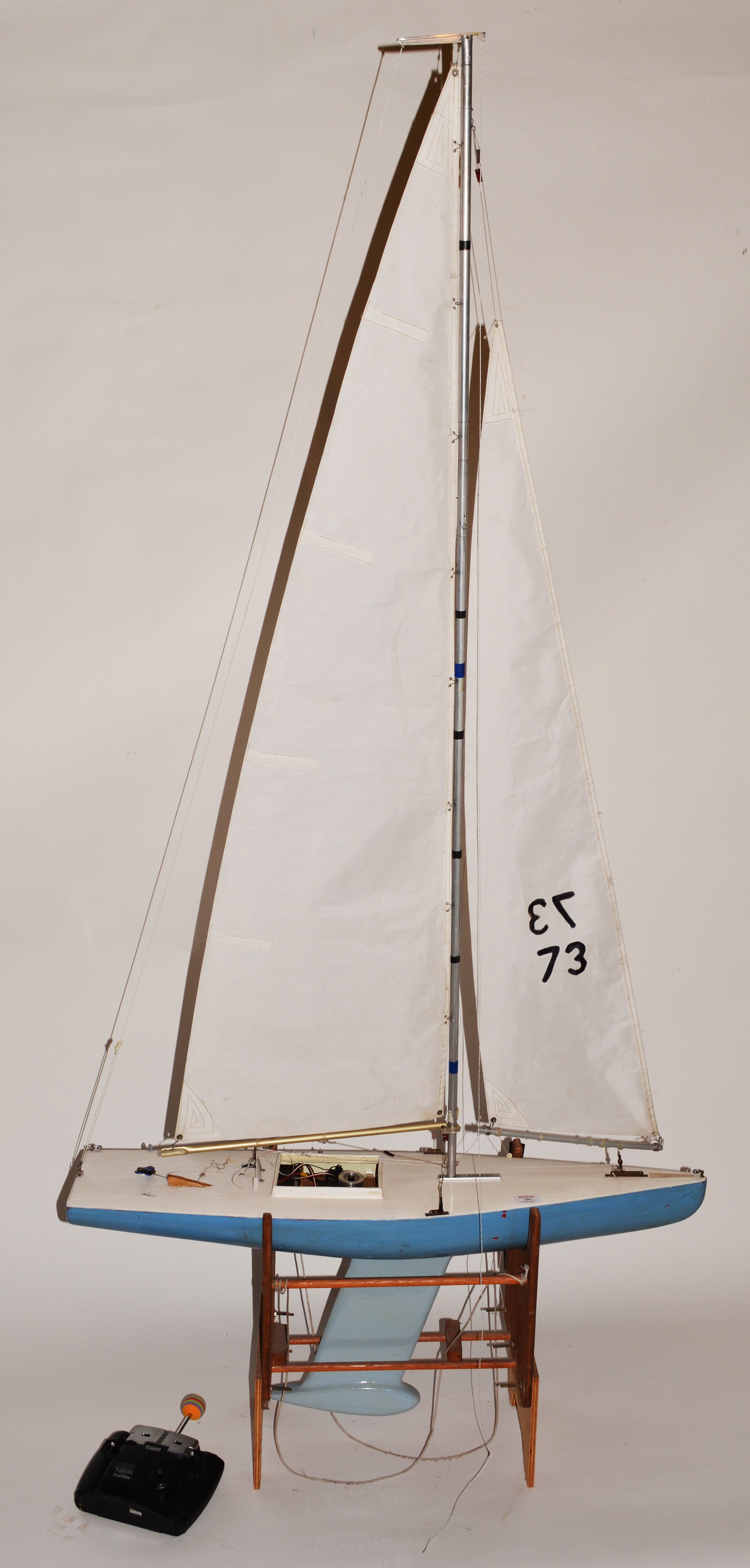 35" R/C yacht, with stand and transmitter.