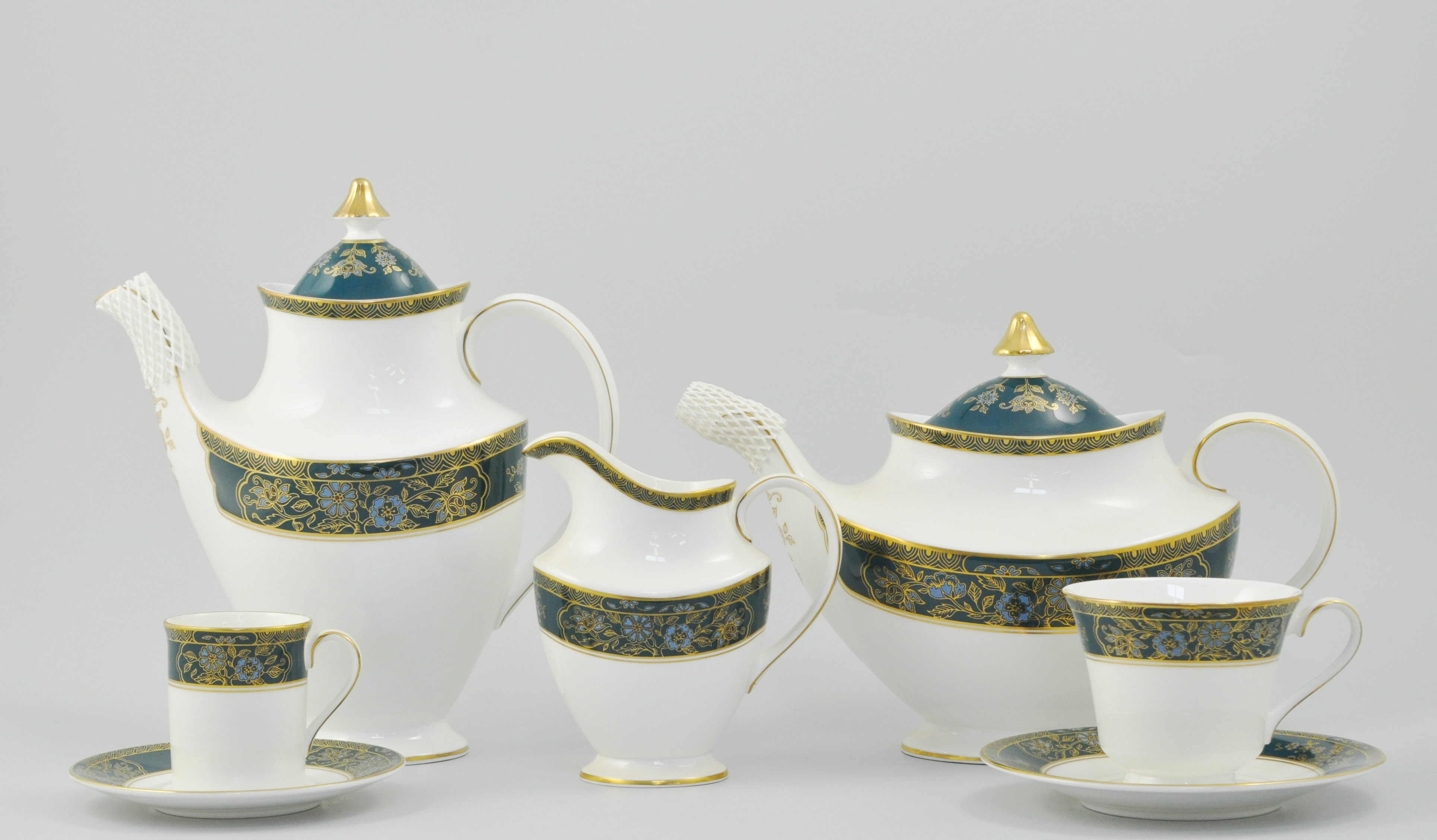 Royal Doulton Carlyle pattern part dinner service, to include two coffee pots, two lidded terrines,