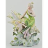 Royal Dux style figural table centre piece, modelled as a scantily clad maiden,