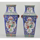 Pair of Chinese porcelain tapered square vases, decorated with figural scenes inside medallions,