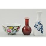 Small Chinese Sang De Boeuf vase,  a polychrome bowl and a small Japanese blue and white vase (3).