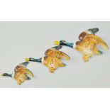 Set of three Falcon ware graduated pottery flying duck wall plaques, no.