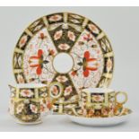 Royal Crown Derby Imari pattern part tea set, to include eleven cups, twelve saucers,