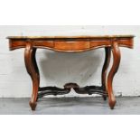 French style rosewood centre table, with a shaped serpentine outline,
