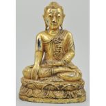 Chinese gilded and carved wood figure of a seated Buddha, plinth base, height 24cms.