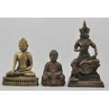 Gilt bronze model of a Buddha, and two other models of Buddhas, (3).