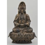 Chinese gilt bronze figure of a Buddha, seated and raised on a lotus throne, height 35cms.