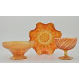 Small collection of Carnival glass, orange tinted, to include pedestal bowls, dishes, etc., (11).