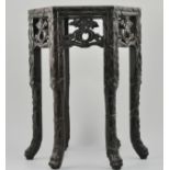 Late 19th Century oriental hardwood jardiniere stand, hexagonal top with marble insert,