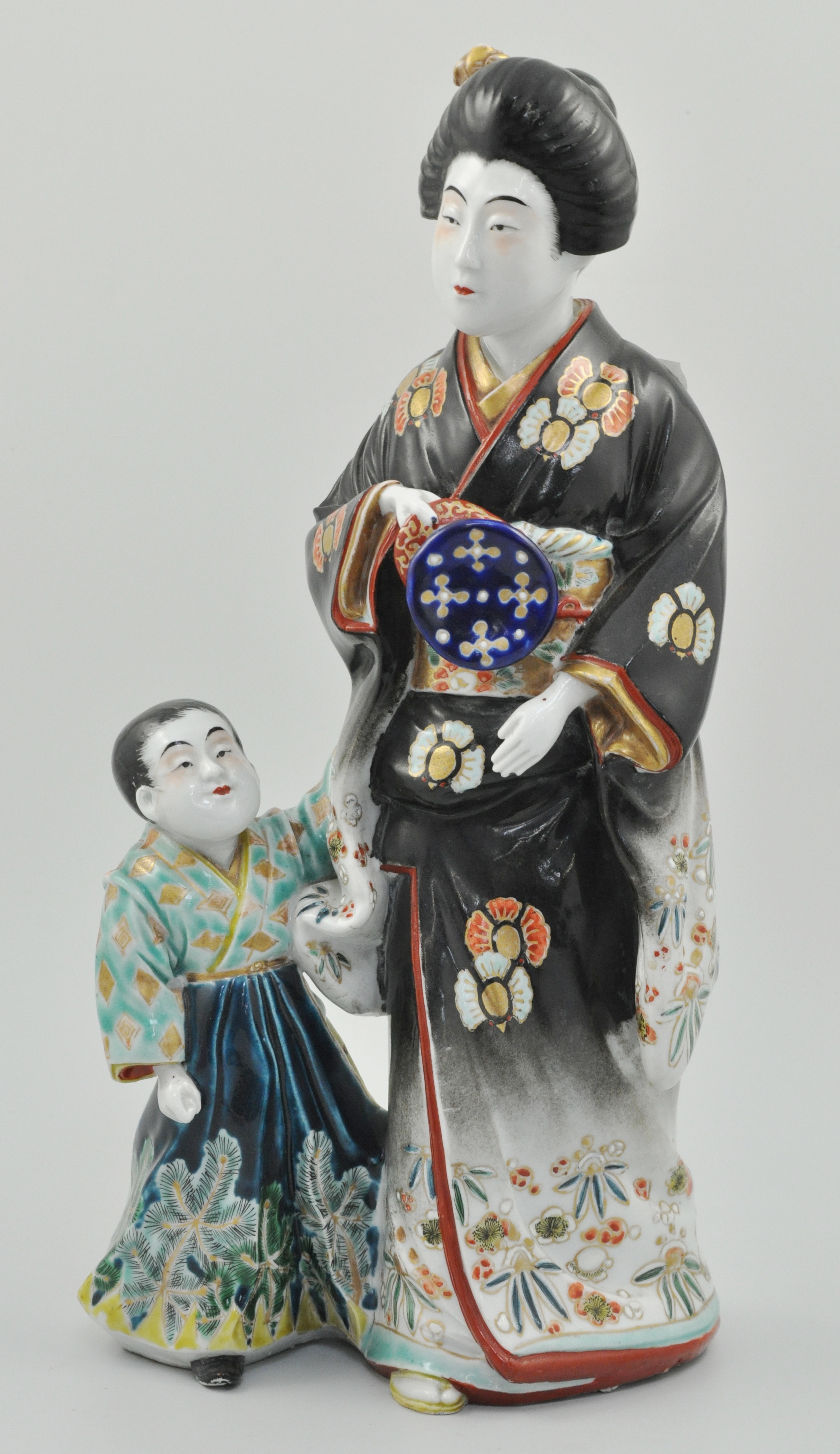 20th Century Japanese figural group, Mother and Child in traditional dress, height 47cms.