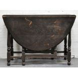 1930's oak gateleg table, turned and ringed legs, height 73cms, width 105cms.