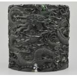 Chinese carved black hardwood brush pot, carved with dragons amongst swirling clouds, height 26cms,