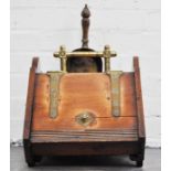 19th Century mahogany and brass coal scuttle, complete with accessories.