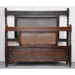 Thonet oak and cane panelled bed.
