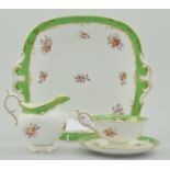 Coalport part tea service, green band and floral hand painted decoration, comprising of twelve cups,