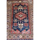 Persian pattern rug, red ground, stylised border, 157 x 250cms.