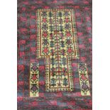 Persian style rug, red ground, stylised border, 140 x 82cms.