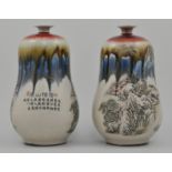 Pair of Chinese double gourd shape vases, decorated with oriental landscapes, height 26cms.