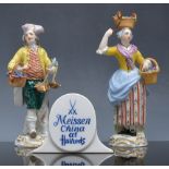 Pair of late Meissen porcelain grape harvest figures, 17cm and 15cm,